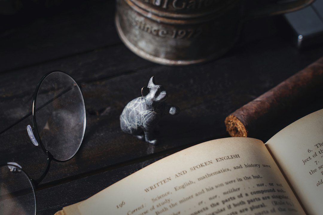 old book with magnifying glass