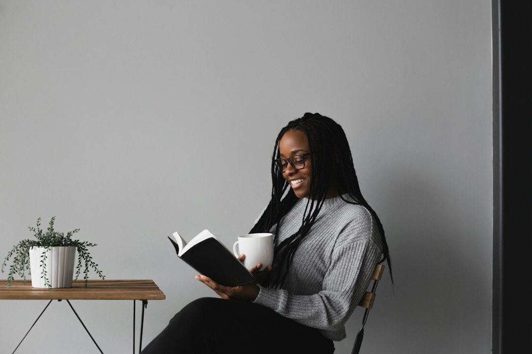 young author reading book