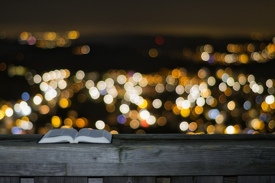 open book on table at night